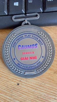 HUY CHƯƠNG CAUMOS -